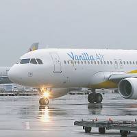 No frills: The first Vanilla Air flight sits at Narita International Airport before taking off for Naha, Okinawa Prefecture, on Friday morning. | KYODO