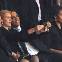 Snap happy: Danish Prime Minister Helle Thorning-Schmidt (center) poses with U.S. President Barack Obama (right) and British Prime Minister David Cameron for a \"selfie\" during the memorial service for former South African leader Nelson Mandela in Johannesburg on Dec. 10 as Obama\'s wife, Michelle, looks on. | AFP-JIJI