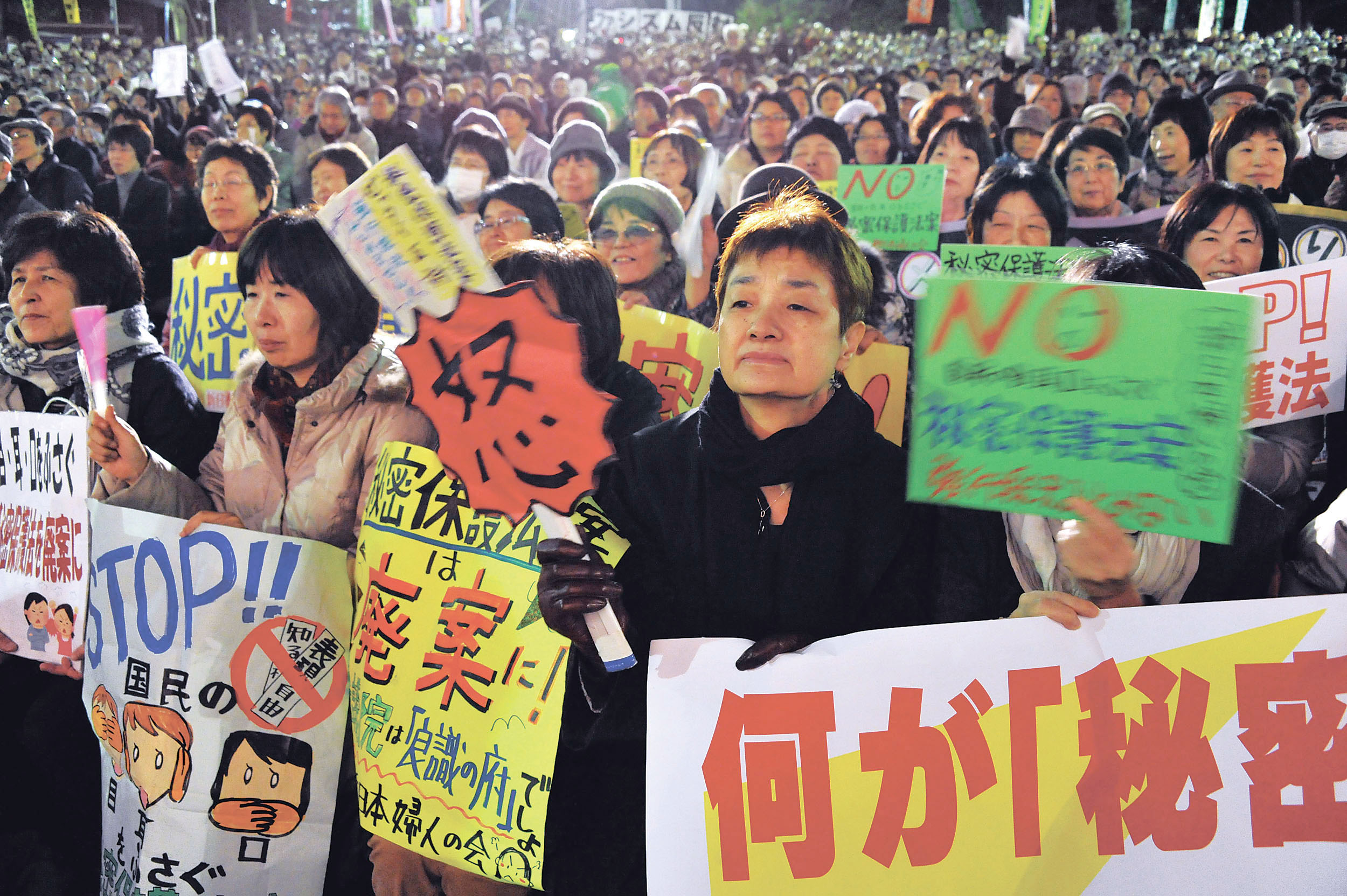 No secrets: Some 15,000 people gather in Hibiya, Tokyo, to protest the state secrets bill Dec. 6, the day the Diet passed it. | YOSHIAKI MIURA