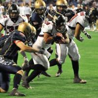 Workhorse: Fujitsu running back Yusuke Shinshi leads the team in carries (54) and rushing yards (481). | HIROSHI IKEZAWA