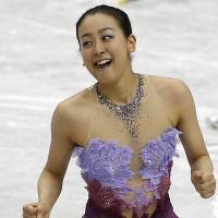 Grand old time: Mao Asada celebrates after her short program at the Grand Prix Final on Thursday. | AP