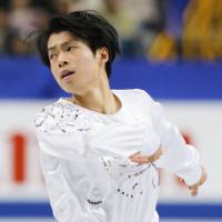 Time to shine: Tatsuki Machida skates in the short program on Saturday during the national championships at Saitama Super Arena. | KYODO