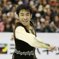 Solid effort: Nobunari Oda earns a third-place finish in the men\'s competition at the Grand Prix Final. | AP
