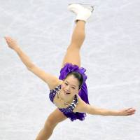 Satisfactory start: Akiko Suzuki is in second place after a solid showing in the short program. | KYODO
