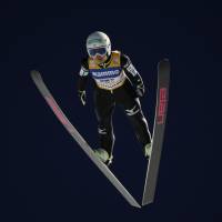 The view from above: Sara Takanashi competes at the World Cup ski jump season-opening event in Lillehammer, Norway, on Saturday. Takanashi won the competition. | AP