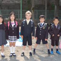 International immersion: Australia-born Finn Hollanders (third from left) is seen among his classmates at their entrance ceremony in April 2012. | COURTESY OF ELIZABETH HOLLANDERS