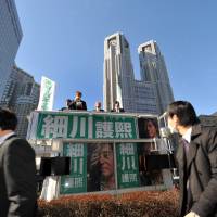 First pitch: Former Prime Minister Morihiro Hosokawa makes a stump speech Thursday in Shinjuku as official campaigning for the Tokyo gubernatorial election got under way. | YOSHIAKI MIURA