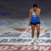 Emotions flow: Mirai Nagasu weeps as she takes the ice for the exhibition gala at the U.S. championships on Jan. 12 after learning she had been left off the 2014 U.S. Olympic team. | AP