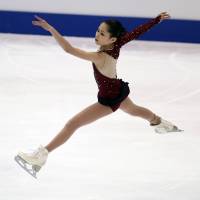 Rising star: Kyoto native Satoko Miyahara, who placed second at the Four Continents last weekend in Taipei, appears on the verge of establishing herself as one of ice skating\'s brightest up-and-coming performers. | AP
