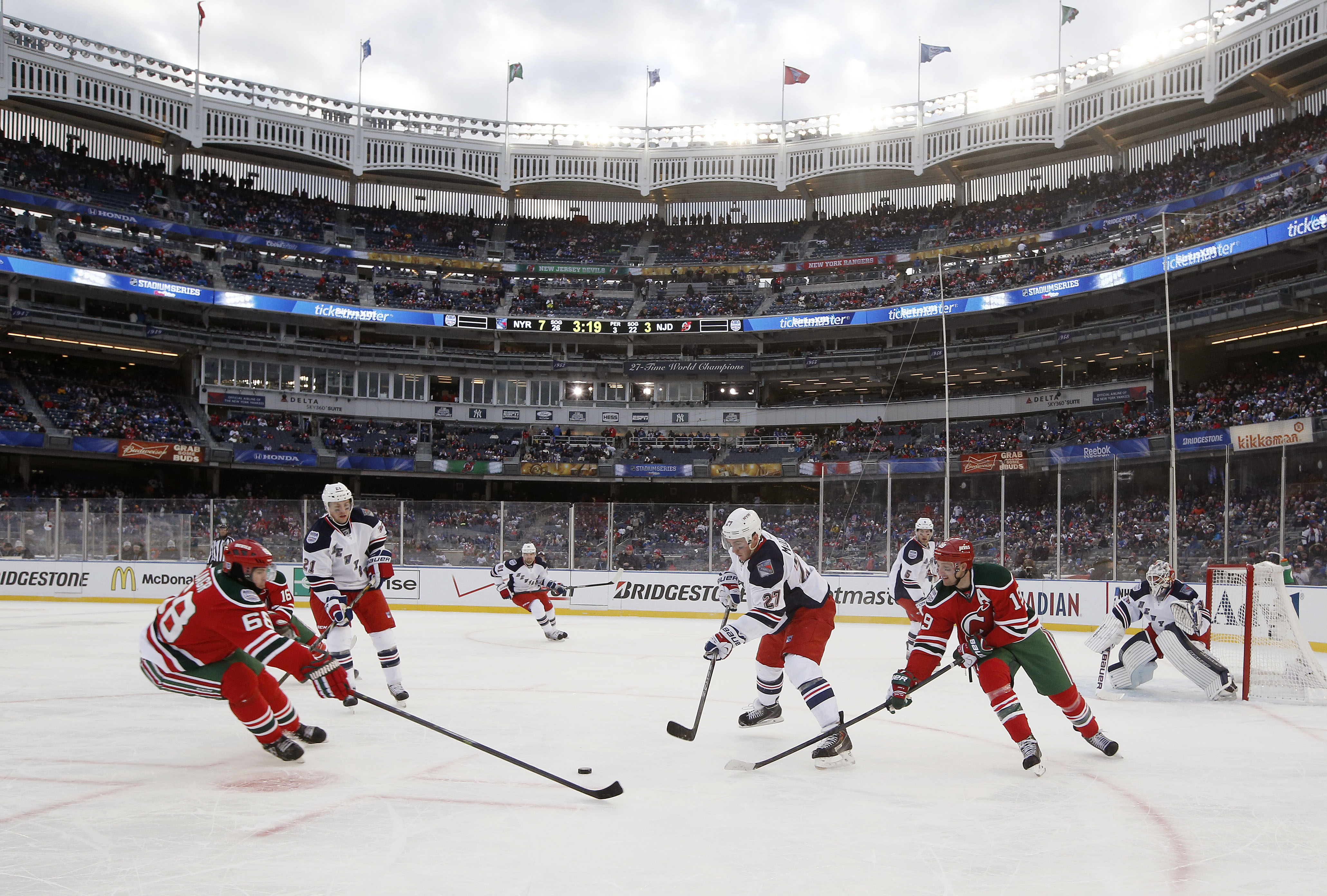 Rangers cruise as Yankee Stadium hosts first NHL contest ...