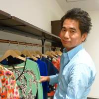 Connections: Enigmo director Hideo Ando sorts through some of the brand-name clothes to be sold on Buyma, the firm\'s \"social fashion site.\" | KYODO