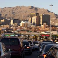 Border line: Vehicles line up to cross into El Paso, Texas, from Ciudad Juarez, Mexico, over the Paso del Norte Bridge on Dec. 26. At 20 years, NAFTA pact hasn't closed wage gap
