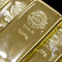 All that glitter: Gold bars are displayed at the Tanaka Kikinzoku Jewelry store in Tokyo on July 10. | BLOOMBERG