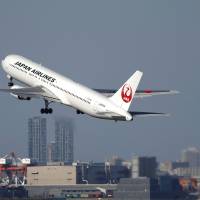 Gear up: A Japan Airlines Co. jetliner takes off from Tokyo\'s Haneda airport on Oct. 27. JAL said Thursday it will launch new direct flights between Tokyo and London and increase other flights from Haneda using allocated new slots. | BLOOMBERG