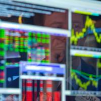 Bottom line: Specialist Peter Elkins is reflected in one of his screens at his post at the New York Stock Exchange on June 17, 2013. Stocks are among the few areas of the economy to fully recover from the 2008 financial crisis. How we scored on calling 2013