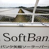 Rays of hope: SoftBank Yaita Solar Park, operated by SB Energy Corp., a unit of SoftBank Corp., is catching rays last August in Yaita, Tochigi Prefecture. | BLOOMBERG