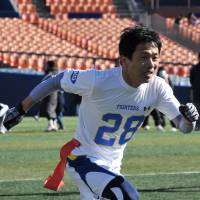 Playing chairman: Hideji Horiko, chairman of the Huddle Bowl organizing committee, played wide receiver for Kwansei Gakuin University. | HIROSHI IKEZAWA
