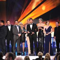 Cleaning up nice: Bradley Cooper accepts a Screen Actors Guild Award on behalf of the cast of \"American Hustle\" last week. | AP