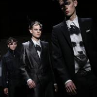 The Alexander McQueen runway show at the London Collections: Men autumn-winter 2014 event showcased slick suits and graphic patterns in blacks and grays. London sets out to be the capital of menswear