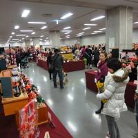 It\'s a small world: Visitors admire Hinamatsuri figurine sets at the Pacifico Yokokama Doll Exhibition | ETHAN SALTER