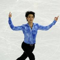 Japan\'s Yuzuru Hanyu competes in the men\'s short program figure skating competition at the Iceberg Skating Palace in Sochi, Russia, during the 2014 Winter Olympics on Thursday. | AFP-JIJI