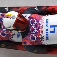 The doubles team of Tobias Arlt and Tobias Wendl of Germany speed down the track in their final run during the men’s doubles luge Wednesday at the 2014 Winter Olympics. Science, not muscle, aids many Sochi wins