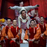 Circus performers take part in the closing ceremony of the 2014 Winter Olympics. | AFP-JIJI