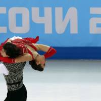 Japan\'s Chris and Cathy Reed perform Saturday in the figure skating team ice dance short dance at the Iceberg Skating Palace. | AFP-JIJI