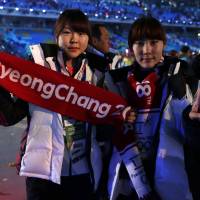 South Korean athletes parade during the closing ceremony of the 2014 Winter Olympics.

 | AP