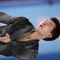 Canada\'s Patrick Chan performs his short program on Thursday. Chan scored 97.52 points and is in second place. | AP