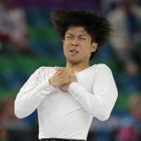 Tatsuki Machida performs his short program on Thursday. He is in 11th place with 83.48 points. | AP