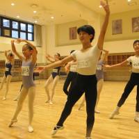 Best feet forward: K-Ballet School pupils practice swordfighting, listen intently and strike classic poses during a rehearsal for ABT\'s \"The Nutcracker.\" | NOBUKO TANAKA