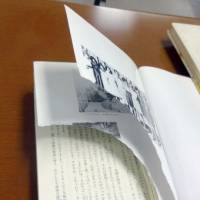 A defaced copy of the \"Diary of a Young Girl\" by Anne Frank is seen Friday at a public library in Tokyo\'s Suginami Ward. | KYODO