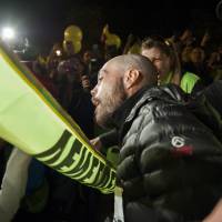 Winner: Melamed crosses the Chicago Marathon finishing line at 16 hours and 46 minutes last year. | ROMINA HENDLIN