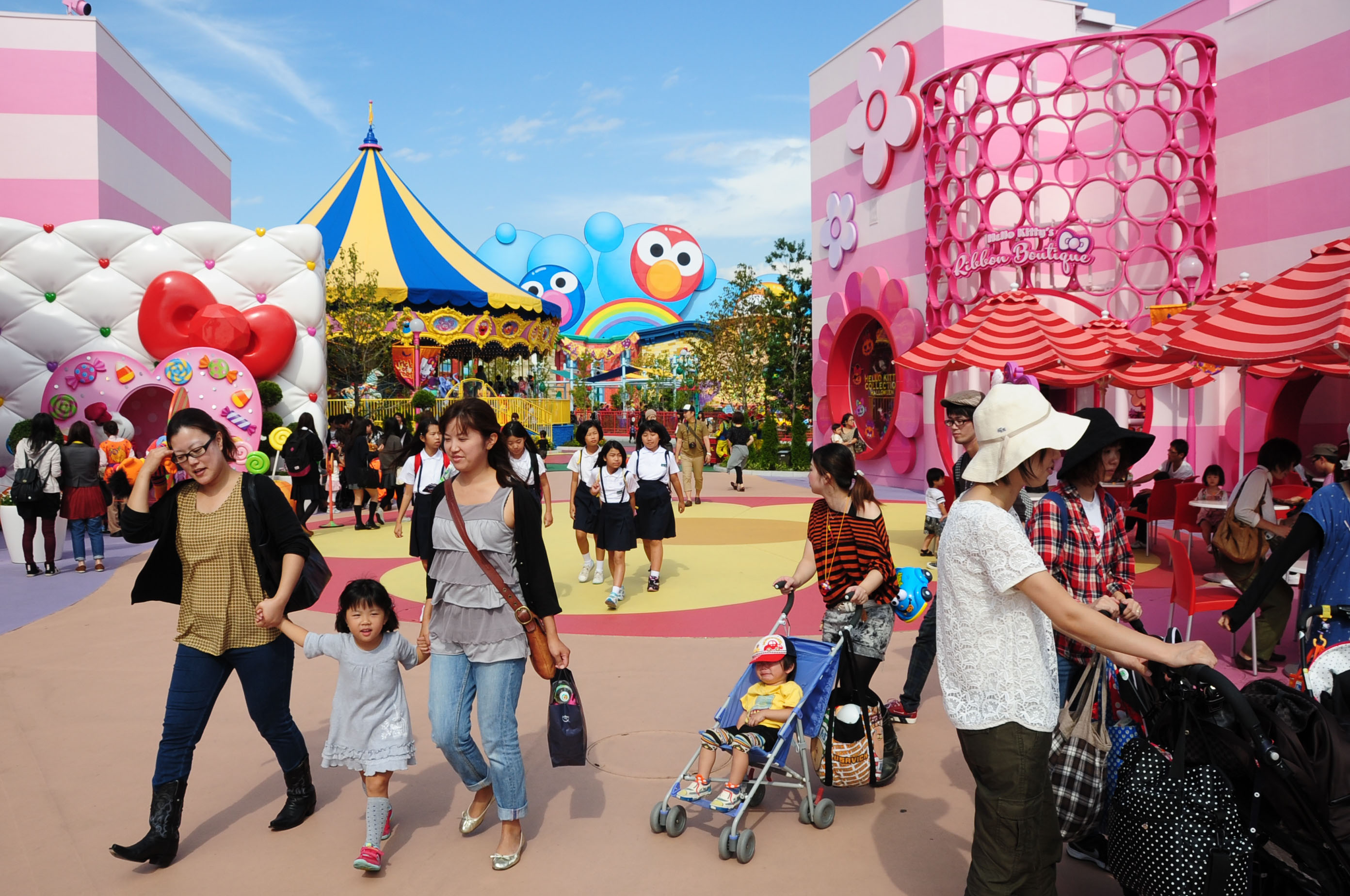 Families and students stroll in the Universal Studios Japan theme park in Osaka. | KYODO