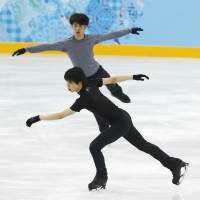 Getting ready: Olympians Tatsuki Machida (above) and Yuzuru Hanyu skate during a practice session on Tuesday in Sochi, Russia. | KYODO