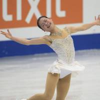 Final performance: Akiko Suzuki takes sixth at the world championships in her last performance before retiring from skating. | KYODO