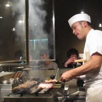 Fuku\'s grillmeister hard at work | ROBBIE SWINNERTON