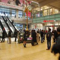 Come together: The station\'s renowned Golden Clock serves as a timely meeting point for many. | REUTERS