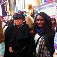 A number of North American fans attending the performance embraced color for the show, sporting candy-bright hair and giant pastel bows. | MAX BRAWER