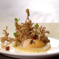 Global dining: Bam, a Spanish tapas restaurant in Singapore, complements its dishes with Japanese alcohol. | REUTERS