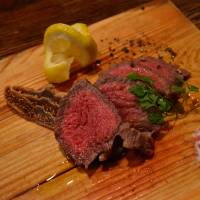 Warm welcome: Rump of beef steak served with Dijon mustard and dried fig at La Tepparnya, a friendly restaurant in Osaka’s Juso neighborhood. La Tepparnya