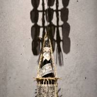 Rice straw has multiple uses, such as a carrying case for a sake bottle. | ROBBIE SWINNERTON