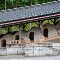 The renowned local potter Shoji Hamada built this climbing kiln in the grounds of his home. Go potter in Mashiko