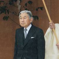 Emperor Akihito walks outside the outer shrine during a visit to Ise Shrine in Mie Prefecture on Wednesday. | KYODO