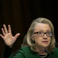 Former U.S. Secretary of State Hillary Rodham Clinton speaks during a January 2013 Senate Foreign Relations Committee hearing in Washington. | BLOOMBERG