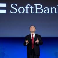 Masayoshi Son, the chairman, president and CEO of SoftBank Corp., addresses the Chamber of Commerce in Washington, D.C., on March 11. $73 billion payoff for SoftBank's ventures fuels push into Japan startups