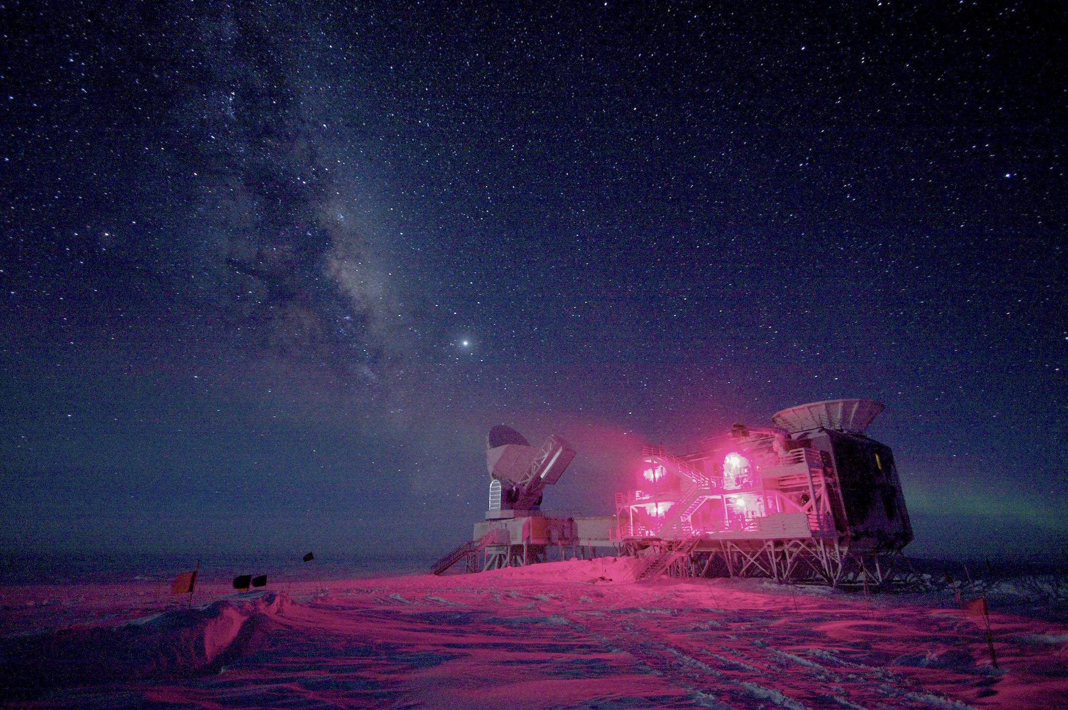 The 10-meter-wide South Pole telescope and the BICEP2 (Background Imaging of Cosmic Extragalactic Polarization) telescope at Amundsen-Scott South Pole Station is seen against the night sky with the Milky Way in August 2008. | REUTERS