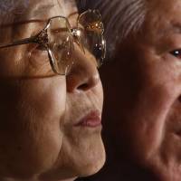Shigeru Yokota and his wife, Sakie, the parents of Megumi Yokota, who was abducted by North Korea in 1977, listen to a reporter\'s question during a news conference at the Foreign Correspondents\' Club of Japan in Tokyo on Monday. | AP
