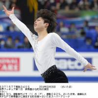 My time to shine: Tatsuki Machida skates during the men\'s competition at the figure skating world championships on Wednesday in Saitama. Machida is in first place after the short program. | KYODO